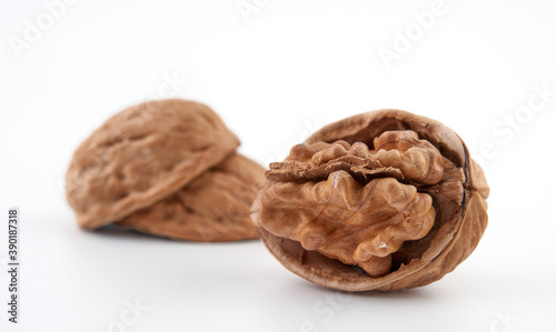 Walnuts in close-up, isolated on a white background.Space for text