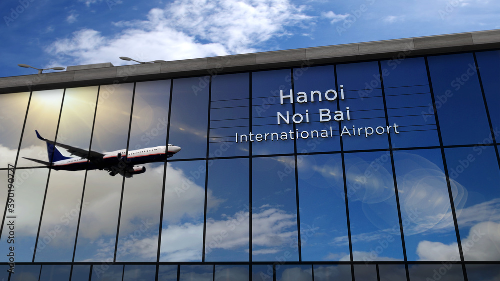 Obraz premium Airplane landing at Hanoi Vietnam airport mirrored in terminal