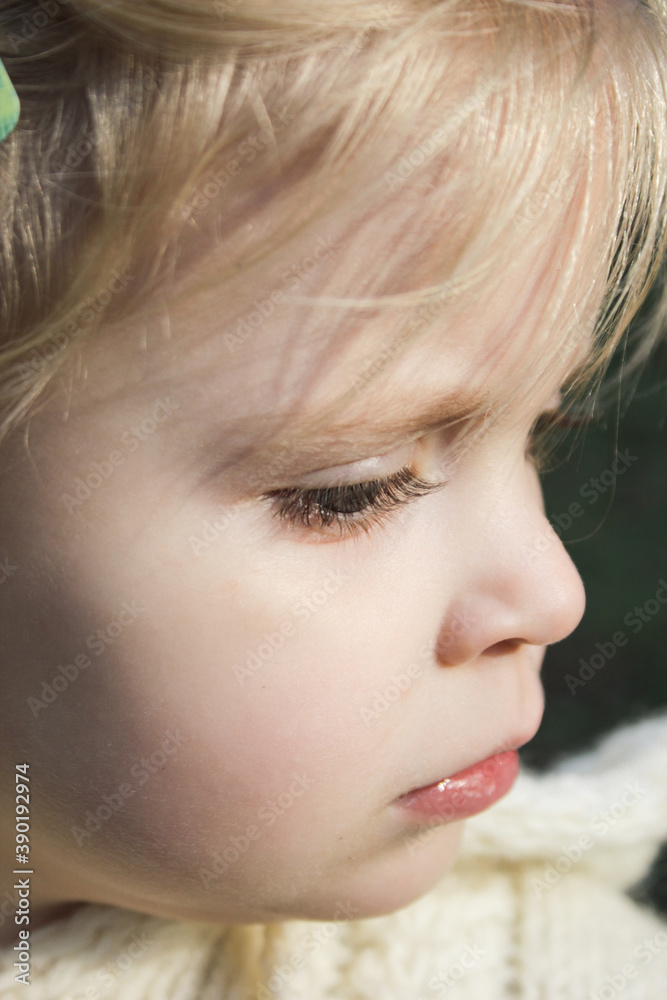 Close up portrait of cute three years old blonde girl. Close up portrait of cute three years old blonde girl.