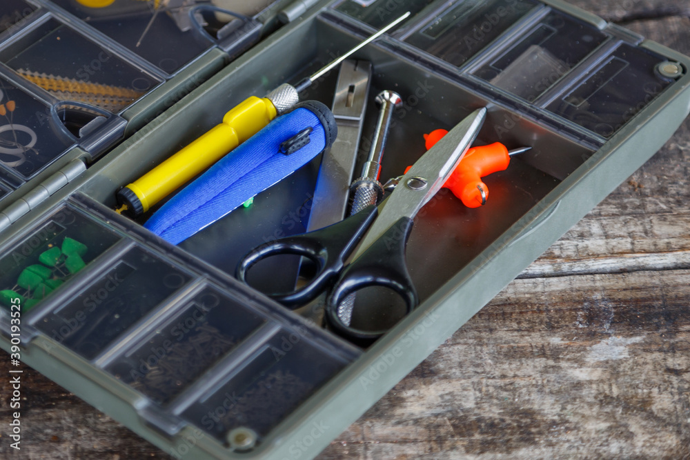 Fishing tackle on a wooden table.Carp fishing.carp fishing tool. Fishing tackle on a wooden table.Carp fishing.carp fishing tool.