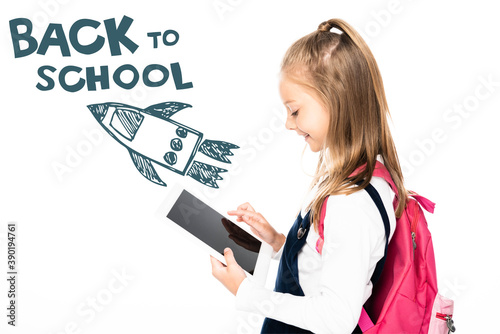 side view of schoolgirl holding digital tablet with blank screen isolated on white  back to school illustration