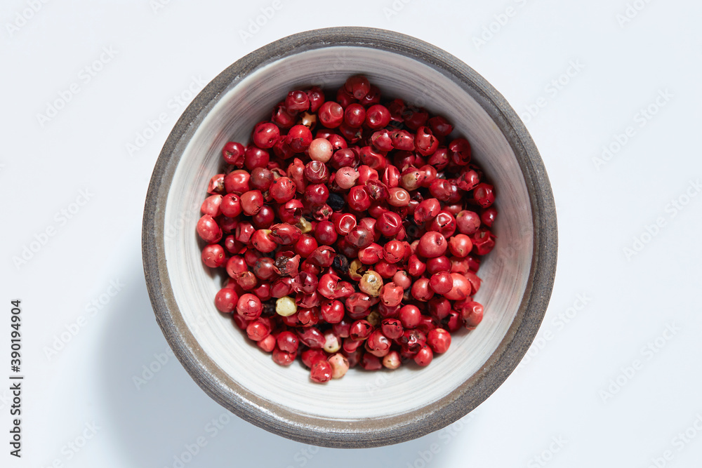 Red peppercorns in bowl Red peppercorns in bowl