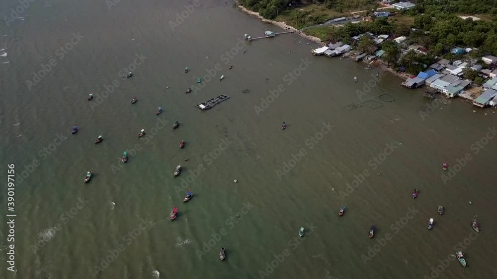 Typical Wooden Fisherman Boats Sailing At Coast Near Town On Island Phu Quoc In Vietnam. - Aerial Drone Shot Typical Wooden Fisherman Boats Sailing At Coast Near Town On Island Phu Quoc In Vietnam. - Aerial Drone Shot