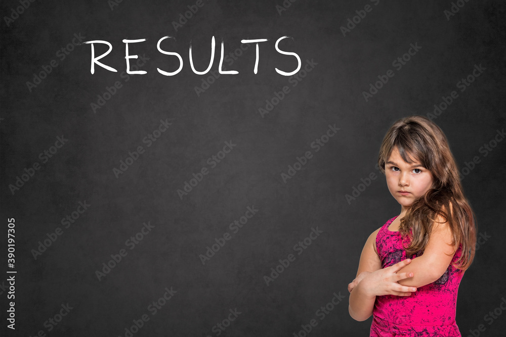 Cute tanned long haired little girl standing in the foreground and drawn sign Results on a black chalkboard is ready for your use. Cute tanned long haired little girl standing in the foreground and drawn sign Results on a black chalkboard is ready for your use.