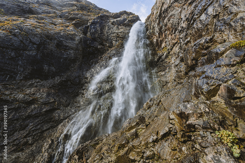 Waterfall in mountain. Hiking and ecotourism in Caucasus mountain. Waterfall in mountain. Hiking and ecotourism in Caucasus mountain.
