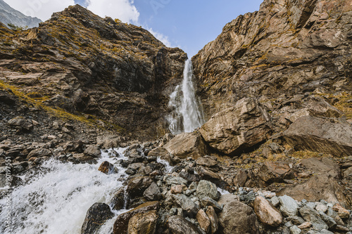 Waterfall in mountain. Hiking and ecotourism in Caucasus mountain. © Danil Nikonov