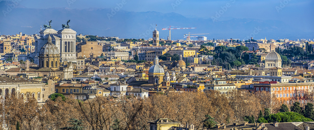 Beautiful panoramic view from above of historical area of Rome at sunset. Rome, Italy.