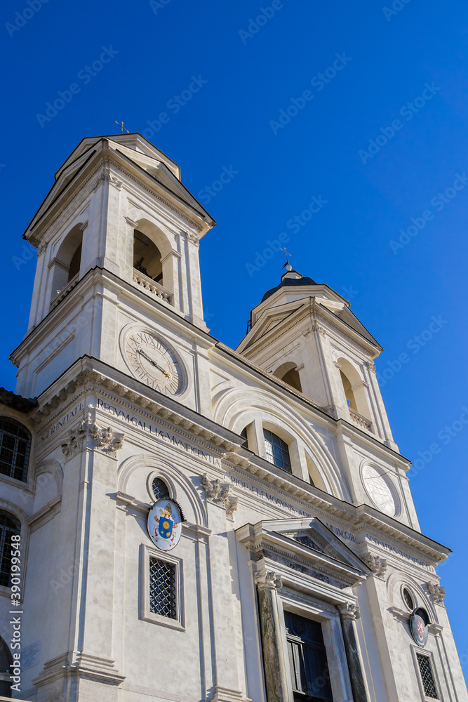 The Santissima Trinita dei Monti - beautiful French church (1502 - 1585) at the top of famous Spanish Steps near Piazza di Spagna. Rome, Italy.