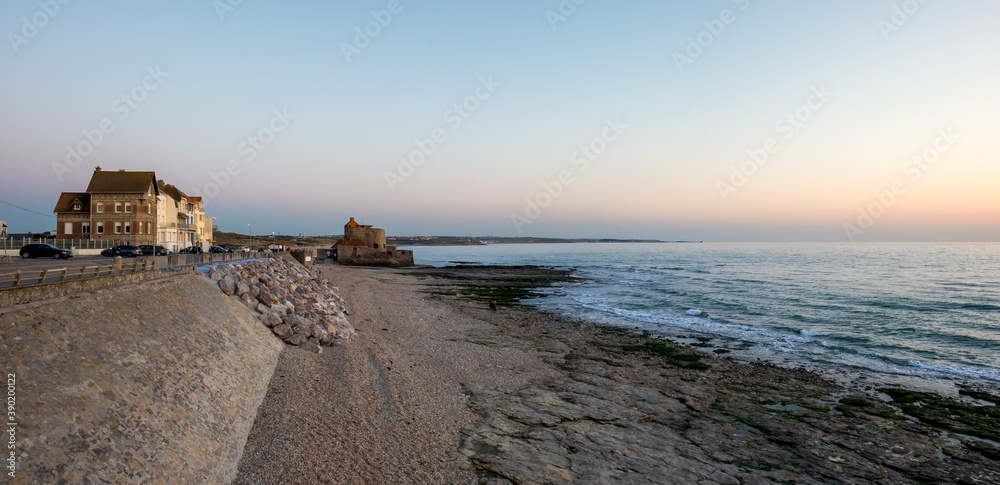 Seafront of Ambleteuse on the French Opal Coast at sunset on a winter's day.