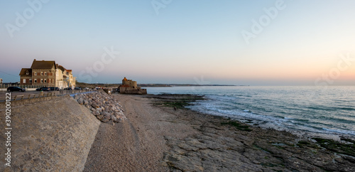 Seafront of Ambleteuse on the French Opal Coast at sunset on a winter's day.