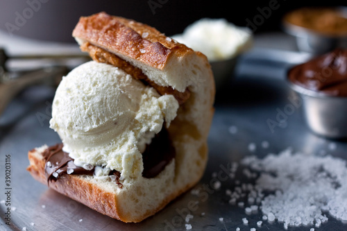Close up of peanut butter and chocolate ice cream sandwich served on plate