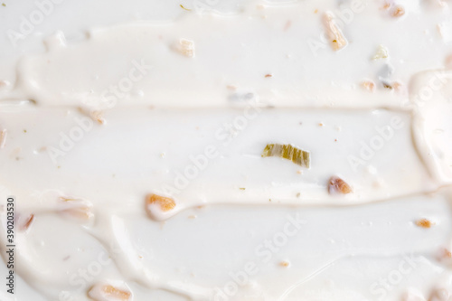 Texture of creamy tartar sauce with green herbs. Top view. Free copy space for text.