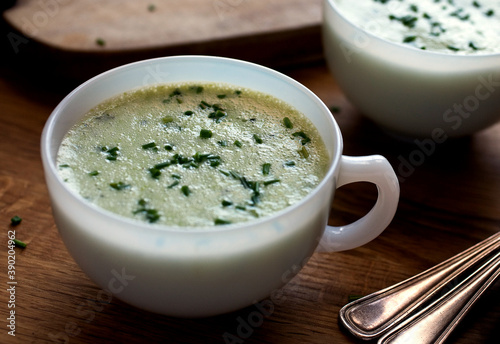 Close up of fava beans and buttermilk soup served in cup photo