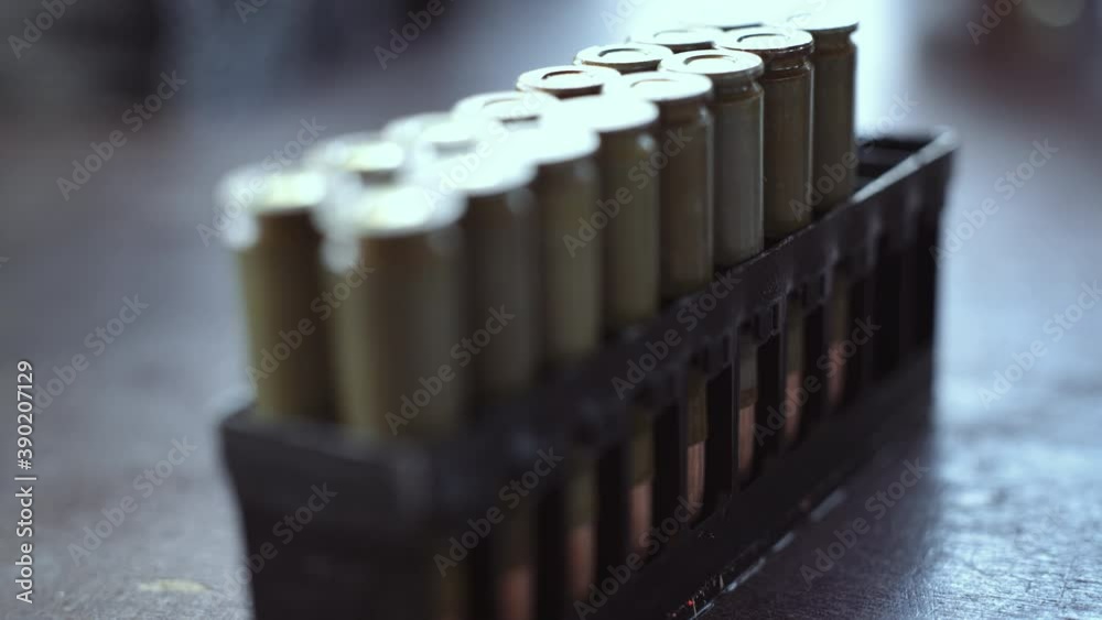 Bullets in packaging on the table. Close-up. Bullets in packaging on the table. Close-up.