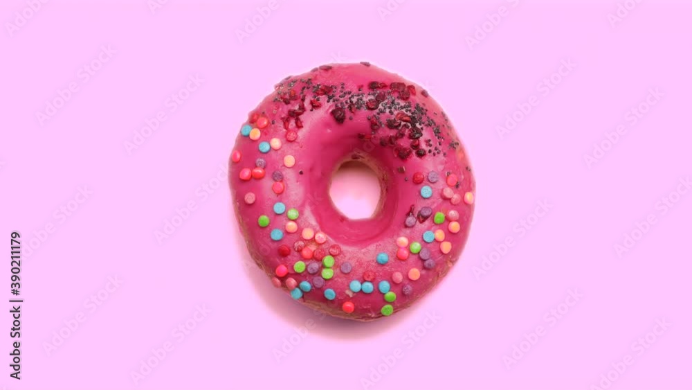 Sweet tasty donut on color background, top view Sweet tasty donut on color background, top view