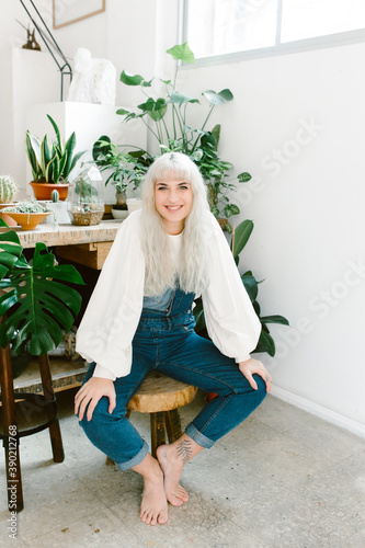 artist young woman in her painting studio.