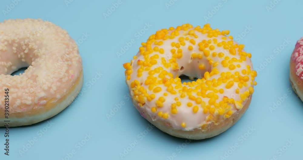 Many different donuts on color background Many different donuts on color background