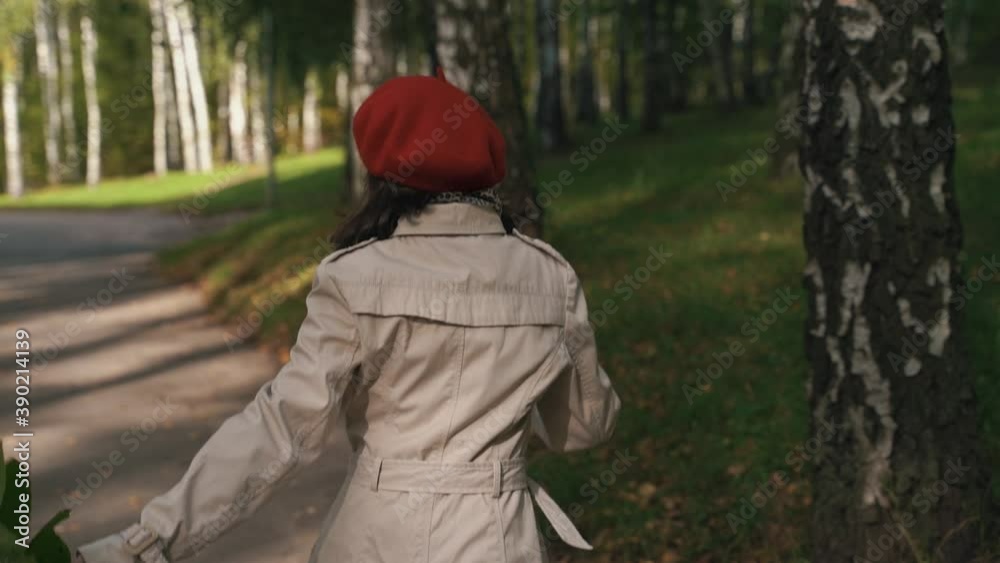 Happy girl walking and jumping in the woods Happy girl walking and jumping in the woods