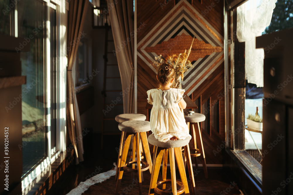 Couple living in tiny house with young child Couple living in tiny house with young child