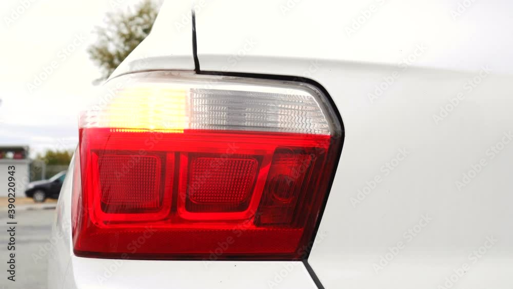 Left turn signal included. Details of white car