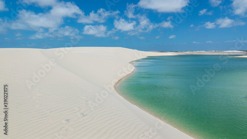 Famous turquoise lagoons located in the north east part of Brazil, close to the ocean (Maranhao region, Lencois Maranhenses). With copy space.