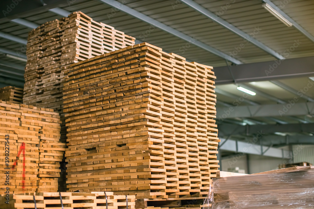 wooden crates stacked on top of each other in warehouse wooden crates stacked on top of each other in warehouse