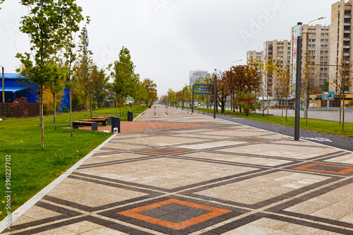 Empty city embankment at autumn. Dnipro city, Ukraine.