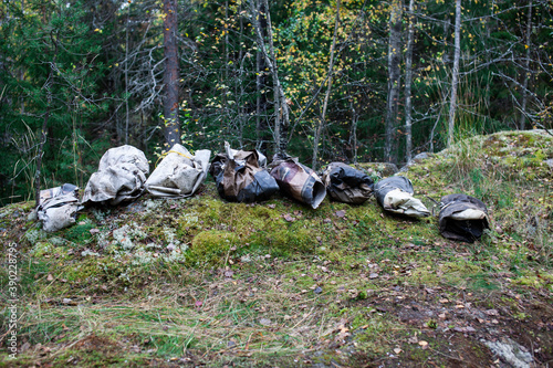 big amount of trash in forest, global environment issues