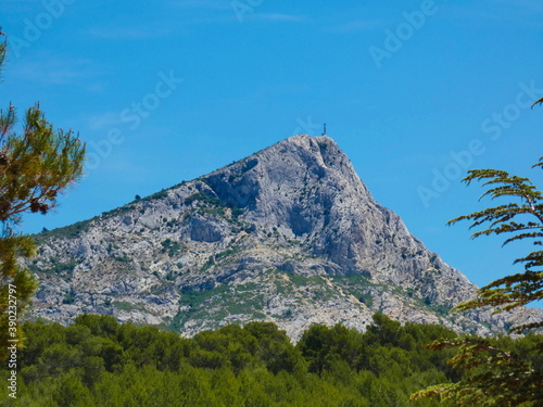 Magnificent landscape with the Sainte-Victoire mountain under a beautiful blue sky in Provence near Aix en Provence