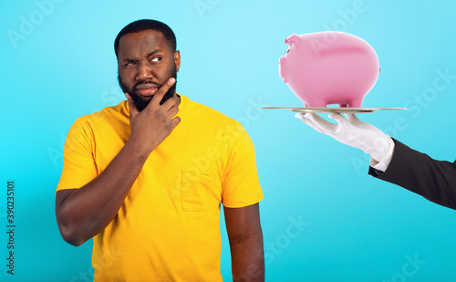 Confused man is suspicious about a guaranteed savings. concept of options, confusion, indecision