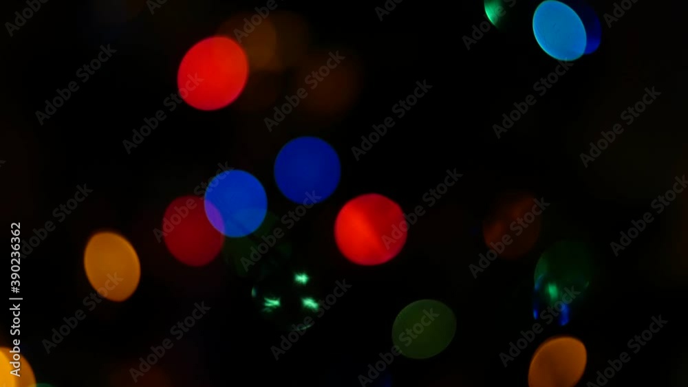 Glare highlights holiday New Year Christmas lights in bokeh. Beautiful blur with light sources Glare highlights holiday New Year Christmas lights in bokeh. Beautiful blur with light sources