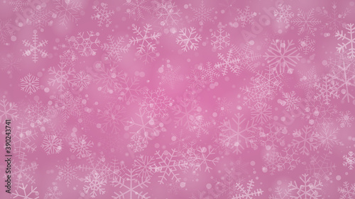Christmas background of snowflakes of different shapes, sizes and transparency in pink colors