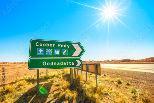 Directions road sign for Coober Pedy mining town in Australia. Opal mining town in the South Australian outback desert. photo