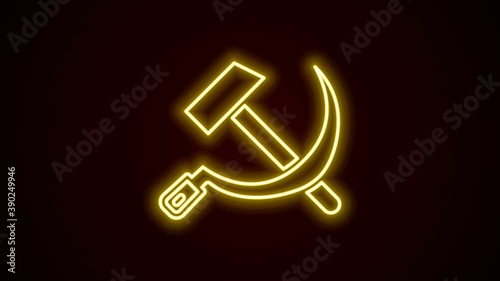 Glowing neon line Hammer and sickle USSR icon isolated on black background. Symbol Soviet Union. 4K Video motion graphic animation