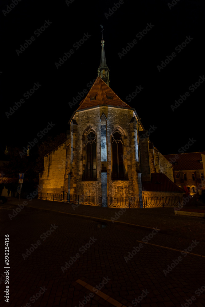 illuminated St. Agnes Monastery, is located on the Vltava bank in the historic area of ​​Prague's Old Town. The probable year of foundation is 1231 at night