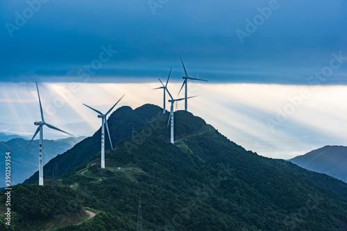 The view of Dingdal and windmills at sunrise at Gia Mountain, Heyuan, Guangdong © hu