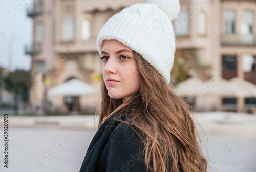 Portrait of young woman wearing winter clothes