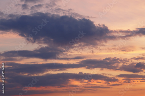 Beautiful bright colorful pink red yellow clouds on dark sky at sunset or sunrise. Evening, morning sky natural eco background. Amazing nature texture surface wallpaper. Dramatic sky. © anoushkatoronto