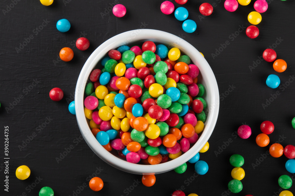 Colorful candy. Colorful sweets background. Black background.