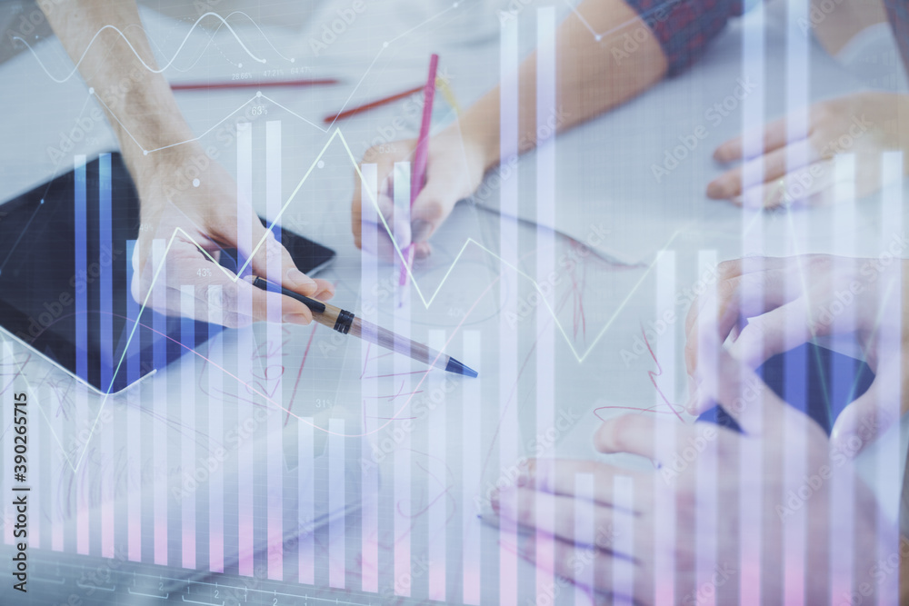 Double exposure of forex graph drawing and man and woman working together holding and using a mobile device. Trade concept. Double exposure of forex graph drawing and man and woman working together holding and using a mobile device. Trade concept.