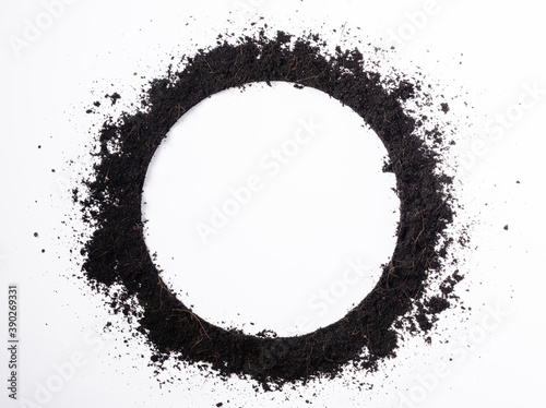 Round circle frame of black land for plant background, Top view of fresh soil with mulch for gardening texture isolated on white background, Concept of global pollution, World Soil Day