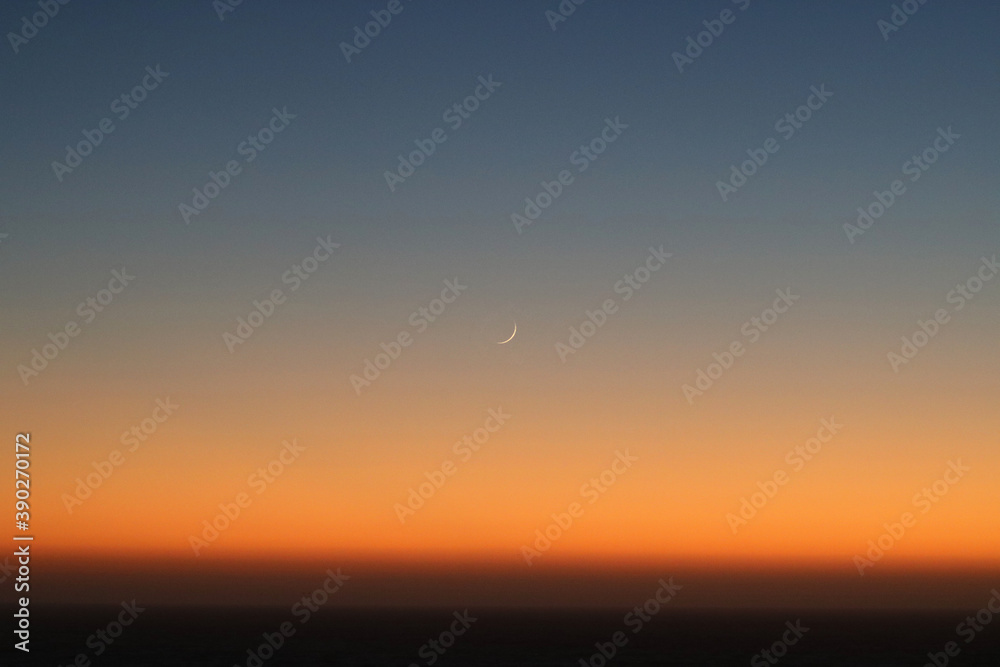 Crescent Moon Over the Pacific