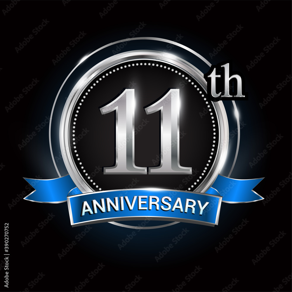 Celebrating 11th anniversary logo. with silver ring and blue ribbon.