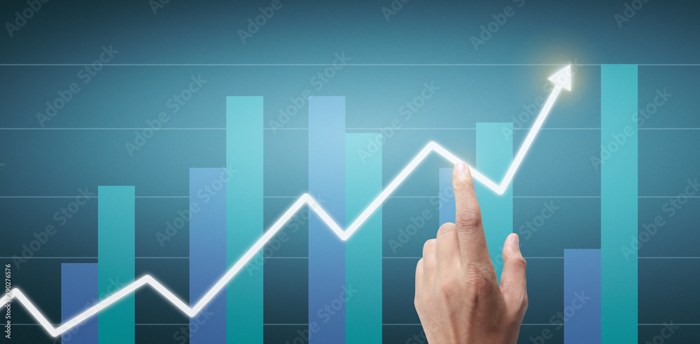 Hand touching a graphs of financial indicator accounting market economy analysis chart Hand touching a graphs of financial indicator accounting market economy analysis chart