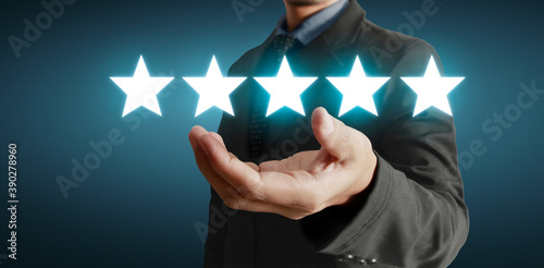 Rise on increasing five stars in human hand, Increase rating evaluation and classification concept