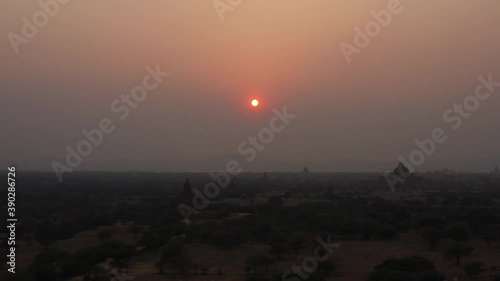 View from above, stunning aerial view of the Bagan Archaeological Zone, Myanmar. Bagan is an ancient city and a Unesco World Heritage Site located in the Mandalay Region of Myanmar. photo