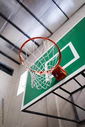 Basketball ring indoor hall with net ready for playing sport