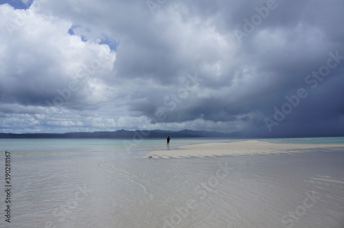 person on sand island