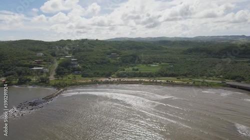 Aerial drone panning over Talofofo Bay on Guam photo