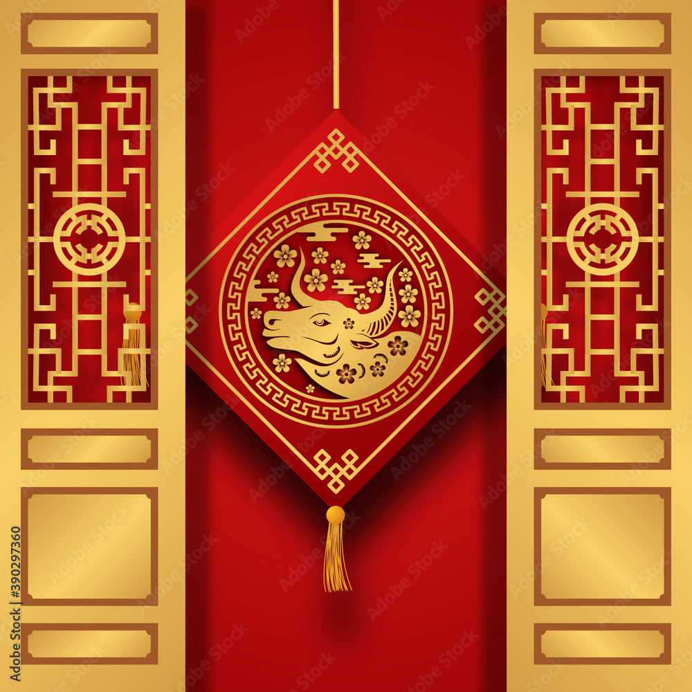 chinese new year 2021, ox year. hanging golden ox decoration with traditional gate door. happy lunar new year
